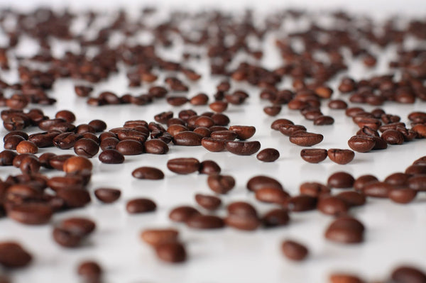 Essse Caffè Espresso Intenso coffee beans with espresso cup and spices – premium Italian blend for rich, intense flavor